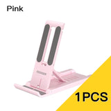 a pink phone stand with a yellow background