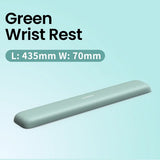 Green elongated ergonomic wrist rest for keyboard use.