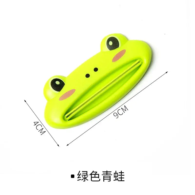 a green frog shaped plastic toy