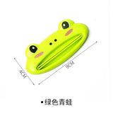 a green frog shaped plastic toy