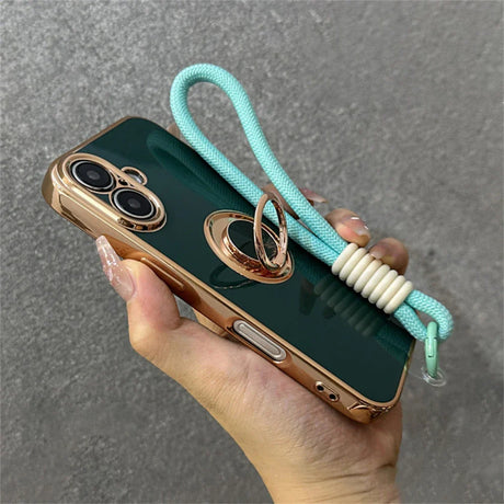 Green and gold phone case with ring stand and wrist strap.