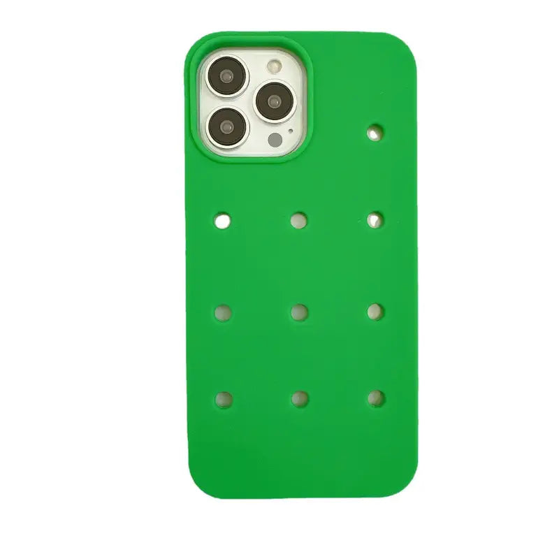 the green iphone case is shown with holes