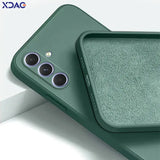 the back of a green iphone case with a pair of sunglasses