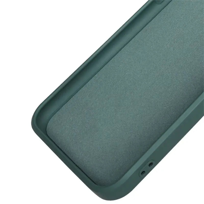 the back of a green plastic case for a smartphone