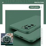 the back of a green iphone case with a watch on it