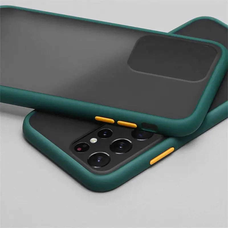 the back of a green iphone case with a yellow handle