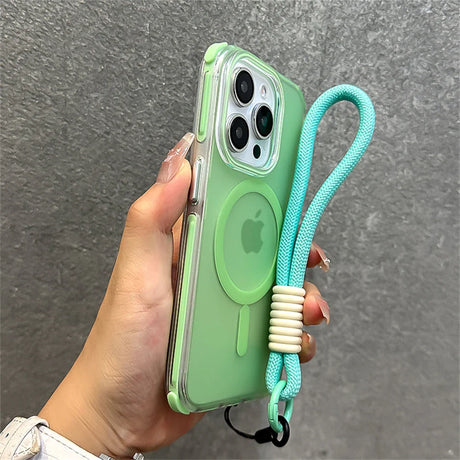 Green iPhone in clear case with turquoise wrist strap.