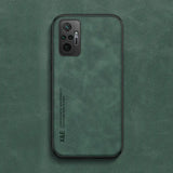 the back of a green leather iphone case