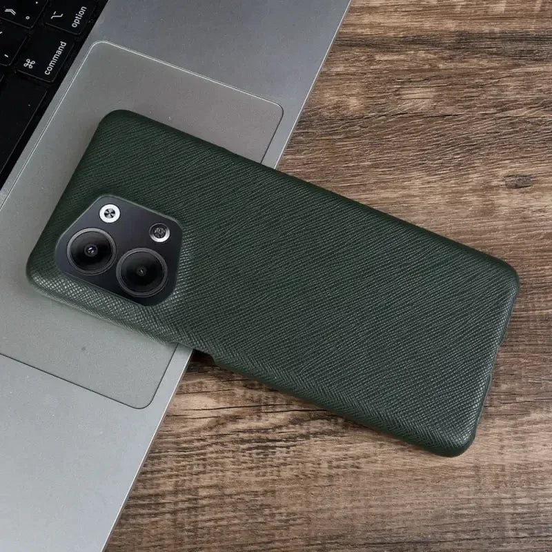 the case is made from a dark green fabric