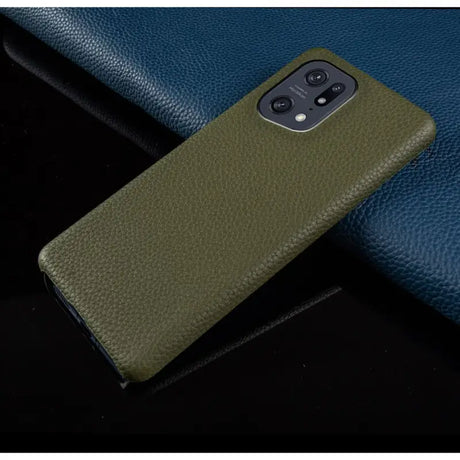 the back of a green leather case