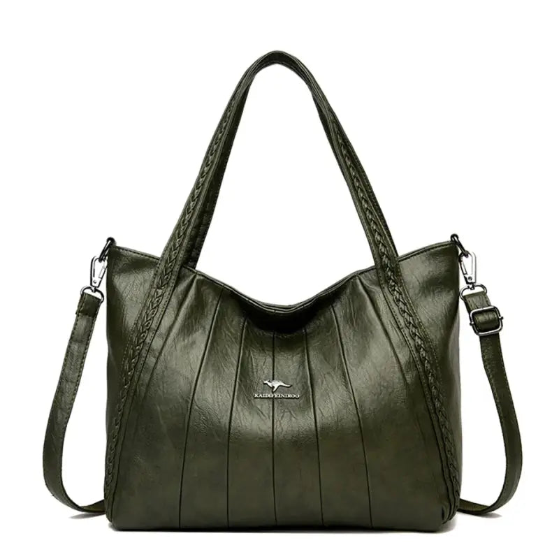 a green leather handbag with braid detailing