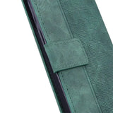 the back of a green leather wallet case