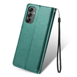 Green leather wallet-style phone case with a wrist strap and visible camera cutouts.