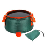 a green and orange sleeping bag with a drawset