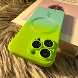 a green phone case with two black lenses