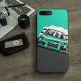 a green phone case with a car on it
