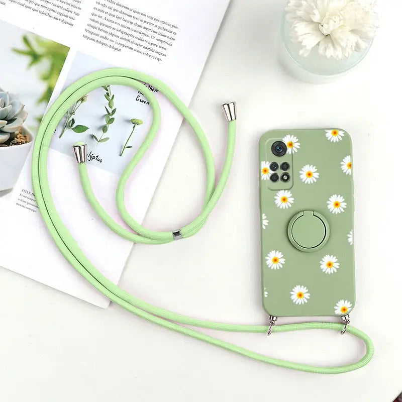 a green phone case with a flower design