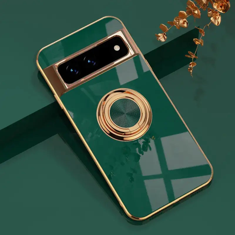 a green phone case with a gold ring
