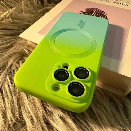 A green phone case with two black lenses