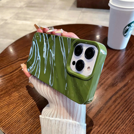 Green phone case with white streaks.