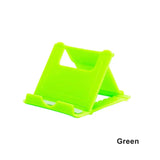 green plastic phone stand