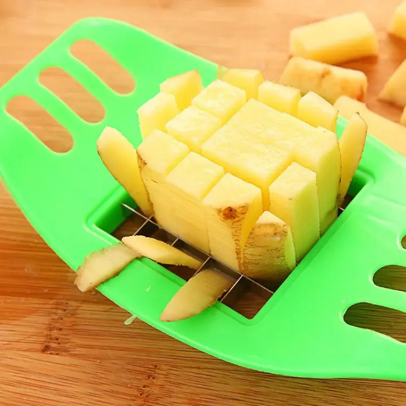 a green plastic cutting board with a slice of pine