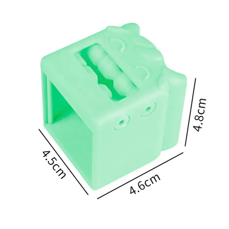 a green plastic box with a handle