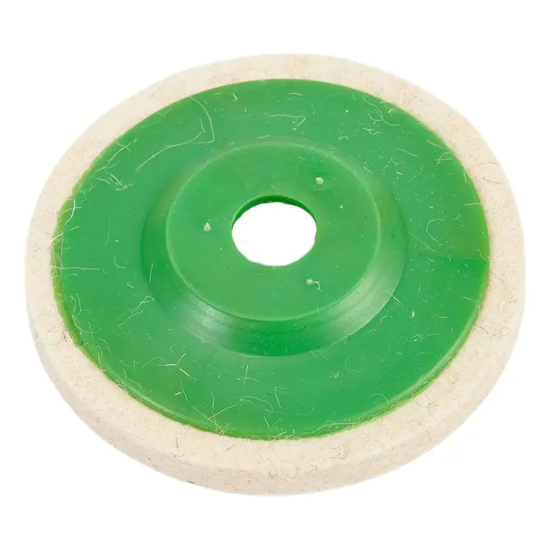 a green polishing wheel