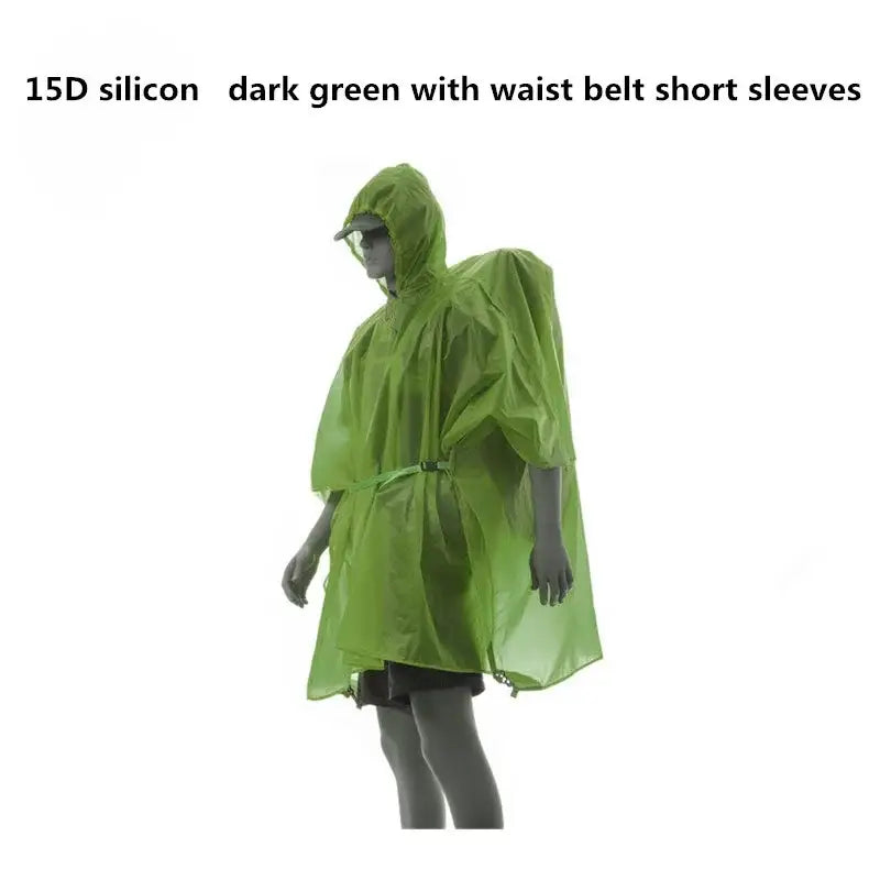 a green rain ponche with hood and hood