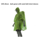 a green rain ponche with hood and hood