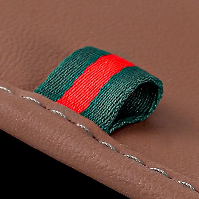 a green and red striped leather with a small red stripe