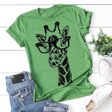 a close up of a green shirt with a giraffe on it