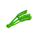 a green plastic shoelacet with a white background