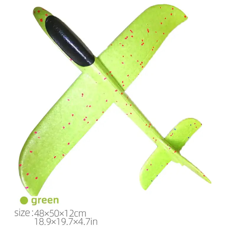 a green knife with red spe on it