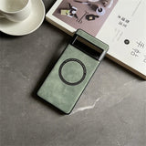 Green smartphone case with a circular design on the back.