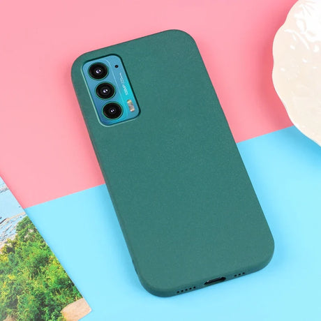 Green smartphone case with a triple camera cutout.