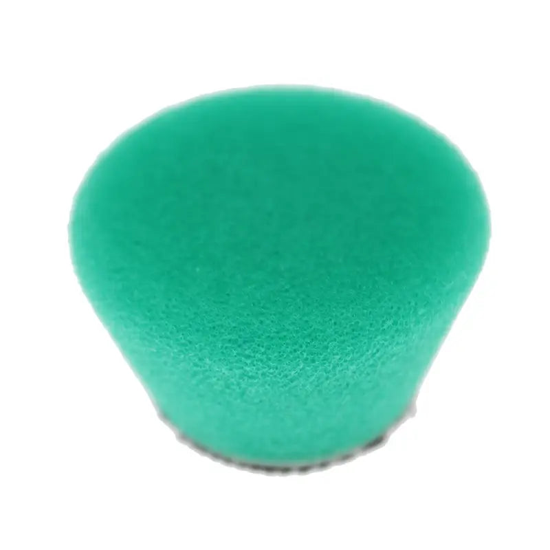 a green sponge sponge on a white background