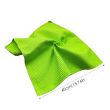 a green bow tie on a white background