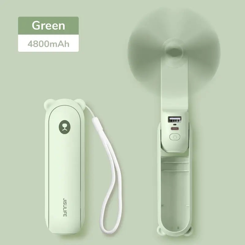 a green and white device with a white cord