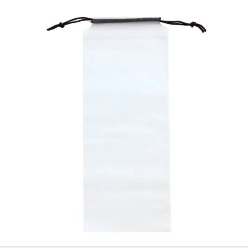 a white paper bag with a black handle