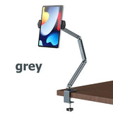 the grey desk lamp with a phone on it