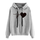 a grey hoodie with a heart on the front