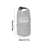 a white laundry bag with a black handle and a black handle