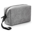 The grey leather cosmetic bag