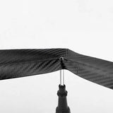 a close up of a black and white photo of a propeller