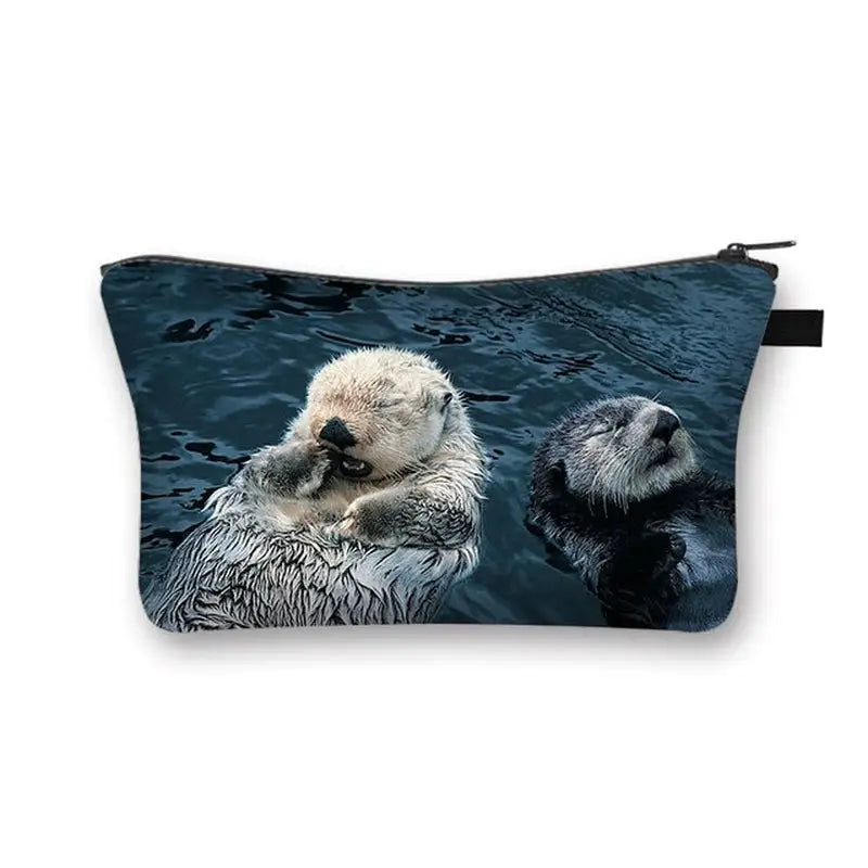 a close up of a small pouch with a sea otter and a sea otter