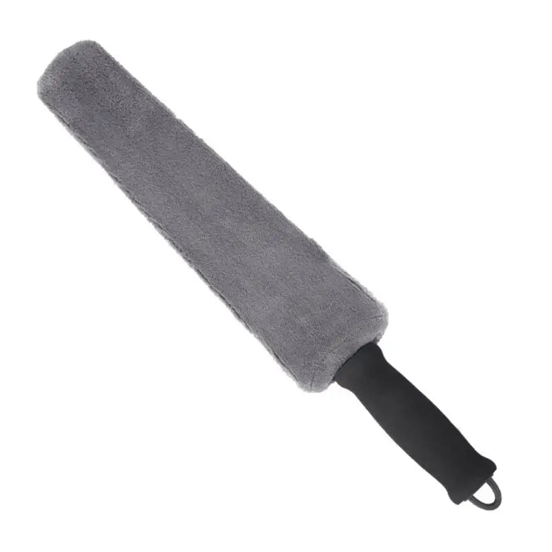 a grey umbrella with a black handle