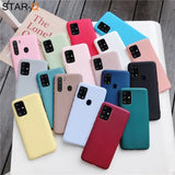 a group of colorful cases sitting on top of a white table