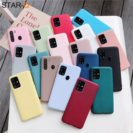 A group of colorful cases sitting on top of a white table