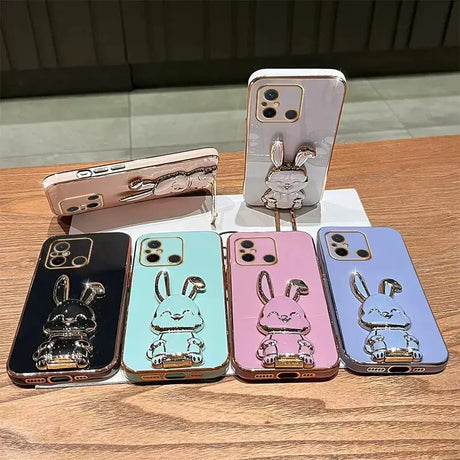 a group of four cases with a cartoon character on them